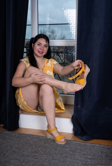 Curvaceous bombshell Tanita pounds her very hairy pussy with a dildo