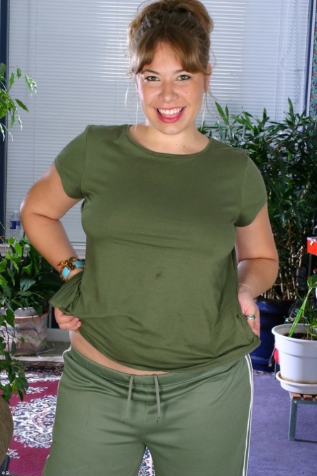 Adorable chubby teen Moonbeam exposes her big tits and bushy twat