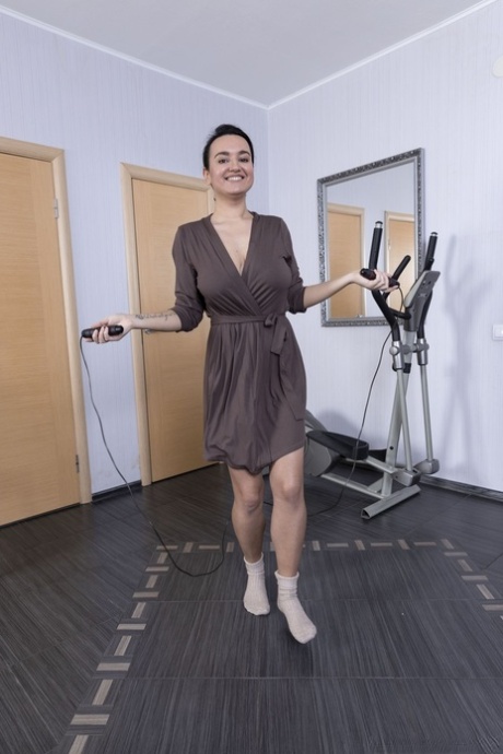 Short-haired amateur Ramira strips after her workout & shows her furry cunt