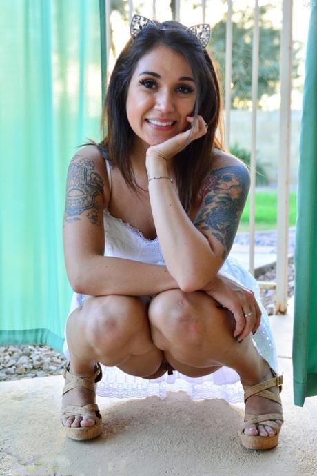 Petite cutie Jynx strips nude and flaunts her titties & shaved vagina outdoors
