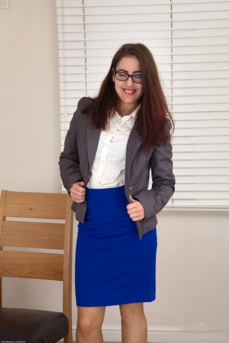 Brunette geek Rabiosa shows her big bum and big tits wearing lingerie