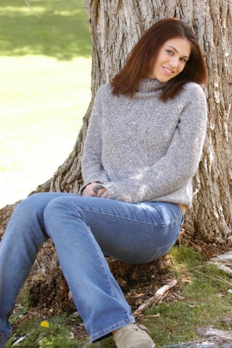 Adorable amateur Kirsten exposes her nice tits and hot ass in the park